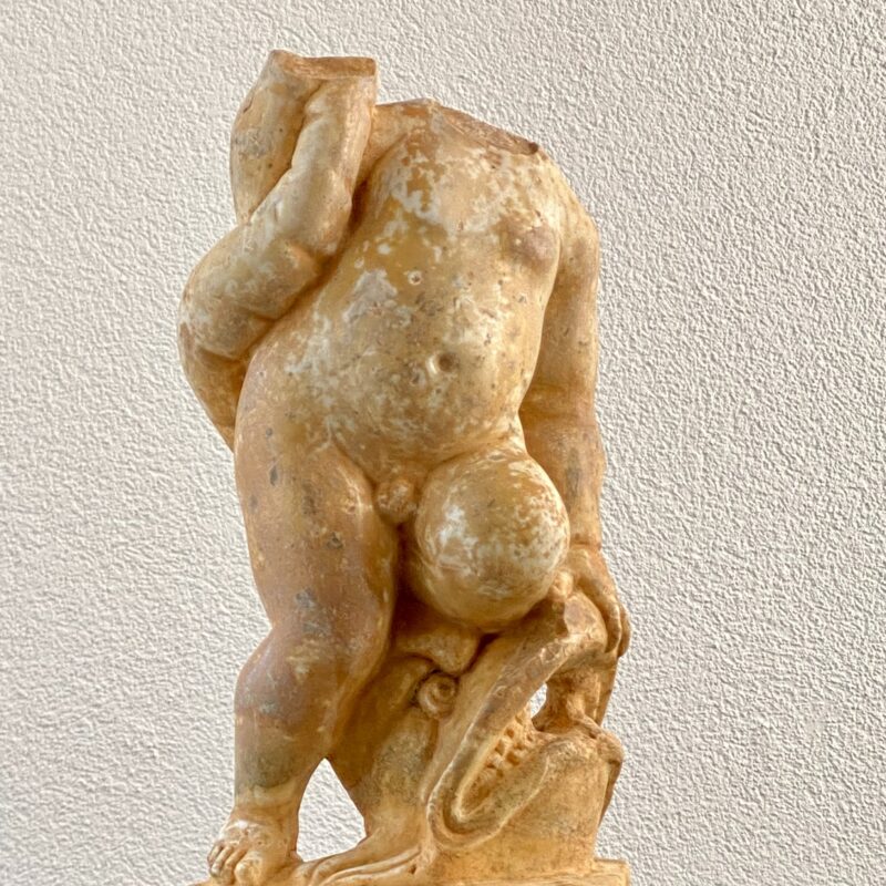 Roman fountain sculpture of a boy with fish