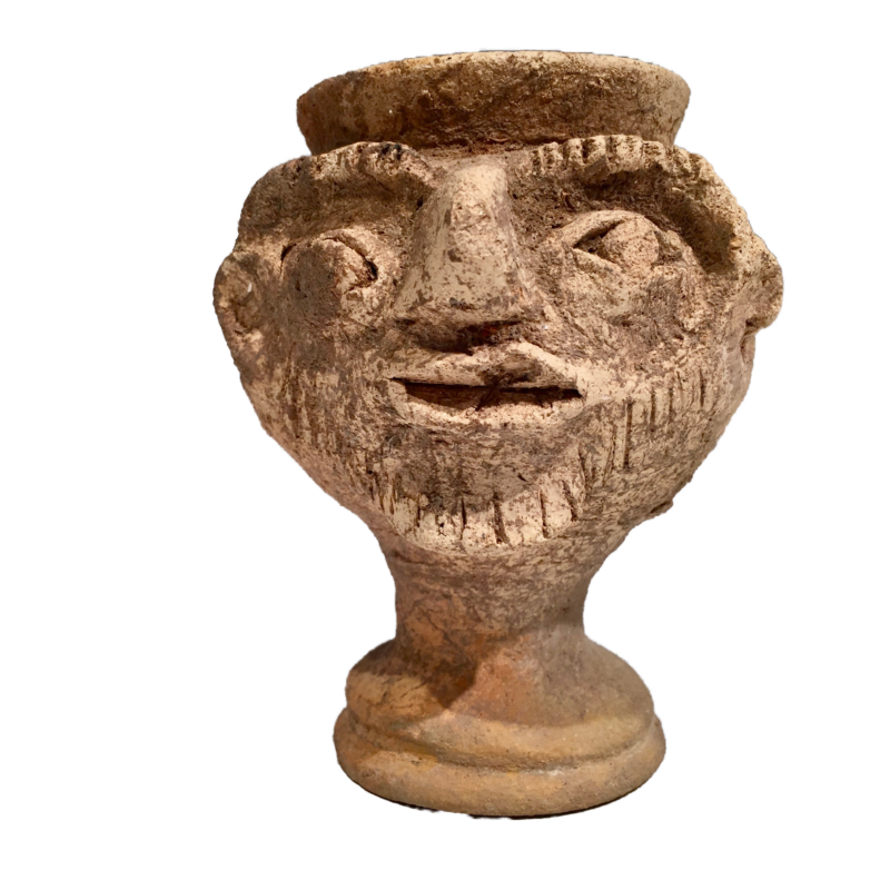 Roman face urn