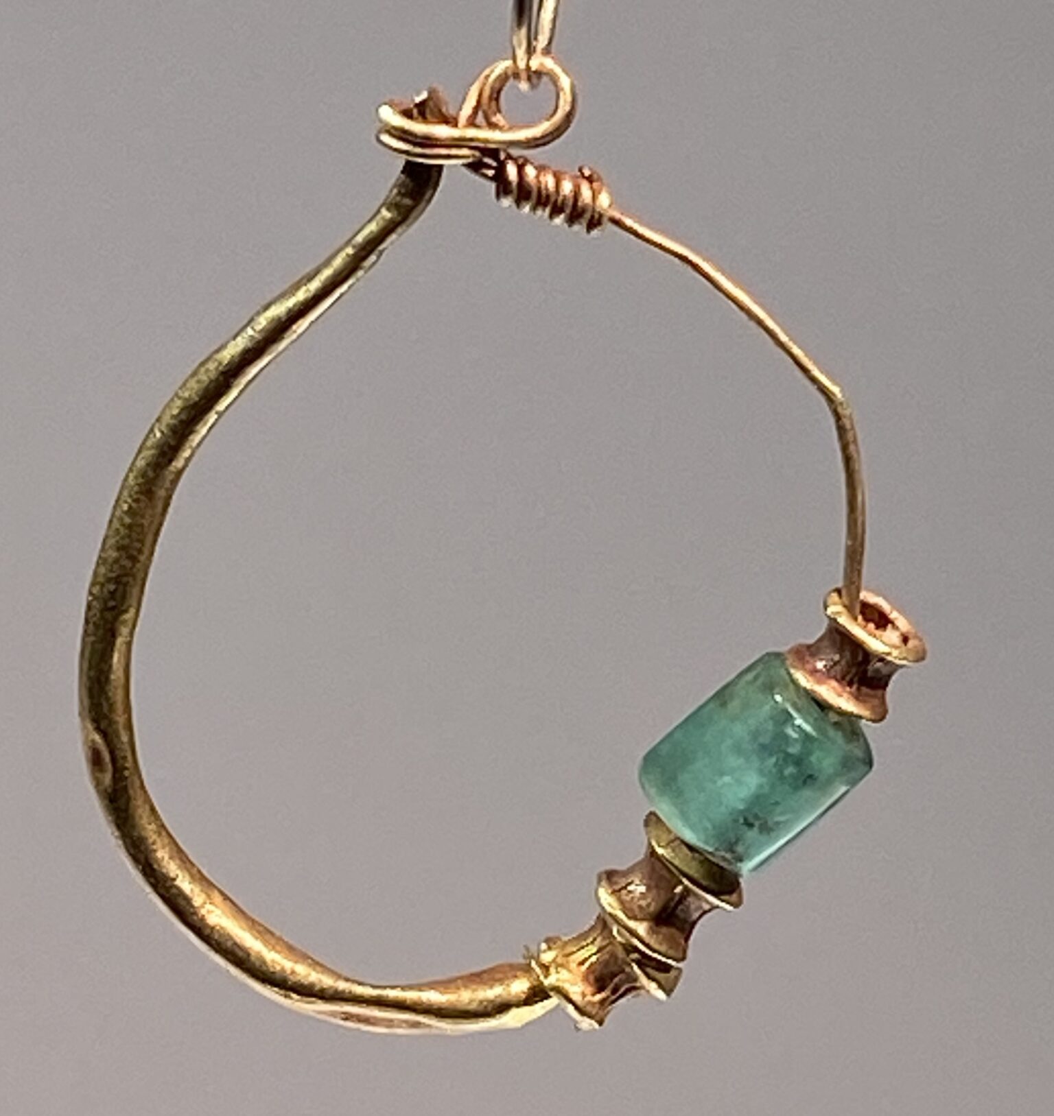 A Single Earring with Emerald Bead